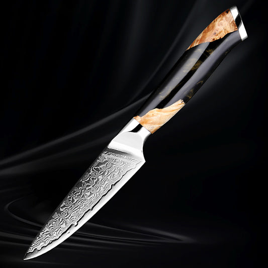 3.5-inch VG10 Damascus fruit knife with a razor-sharp patterned blade and an elegant black and woodgrain handle, set against a dark background.