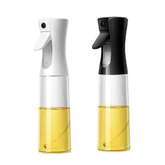 Two Oil & Vinegar Spray Bottles in black and white, filled with golden oil. Ideal for precise cooking, grilling, and salad dressing. Elegant and practical kitchen tool.