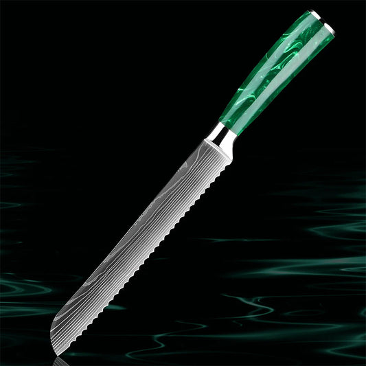 The Kitchen Knives - Razor Sharp Green bread knife features a serrated high-carbon stainless steel blade, designed for effortlessly slicing through crusty bread, cakes, and soft pastries without crushing them. The ergonomic green resin handle offers a comfortable, non-slip grip, ensuring precision and control. A stylish and essential tool for any kitchen. https://www.greengrillshop.com/products/kitchen-knives-razor-sharp-green