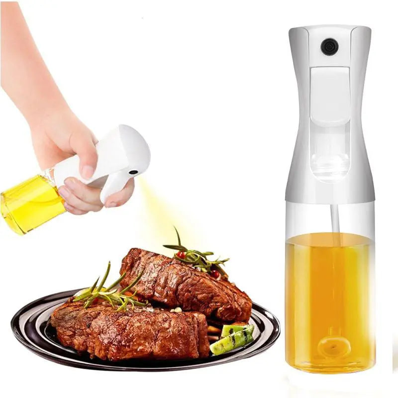 A white Oil & Vinegar Spray Bottle being used to evenly spray oil over a plate of grilled steak, with another full bottle standing beside it.