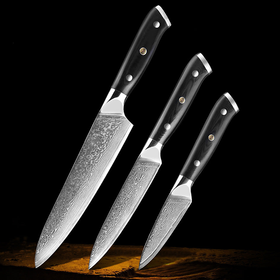 Professional Damascus Kitchen Knife Set – A premium collection of 3 high-quality Damascus steel knives with ergonomic black handles, crafted for precision and durability.