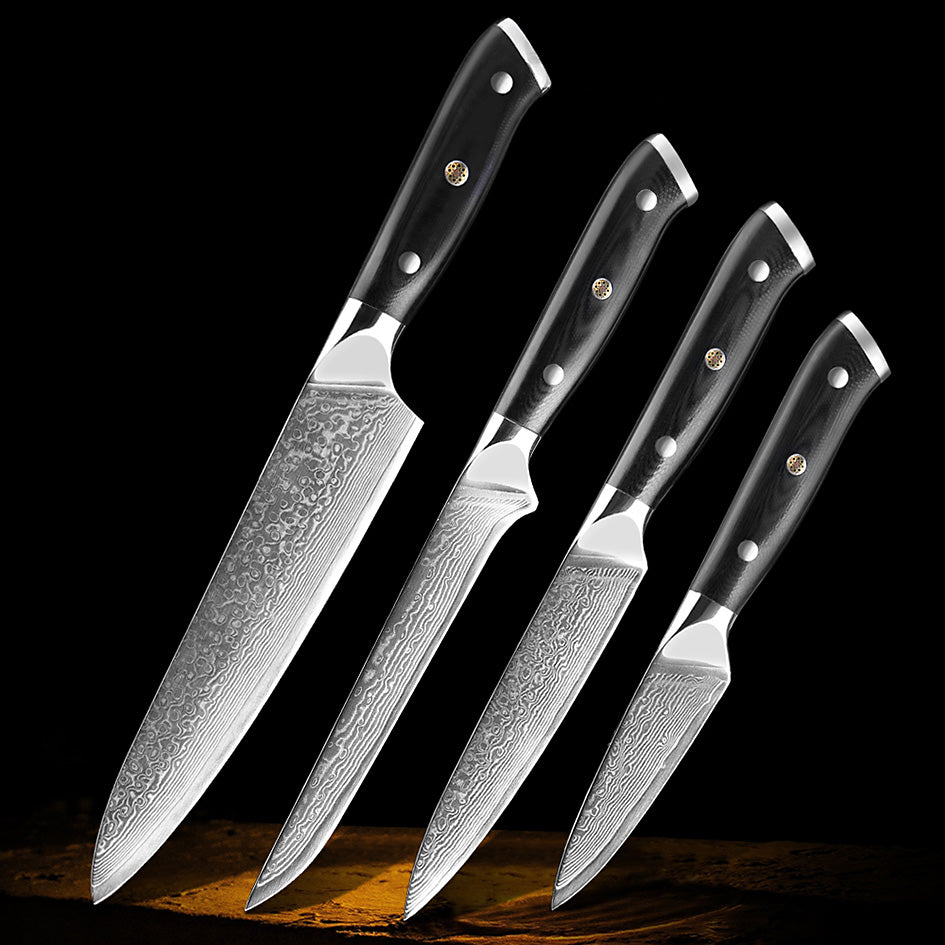 Professional Damascus Kitchen Knife Set – A premium collection of 4 high-quality Damascus steel knives with ergonomic black handles, crafted for precision and durability.