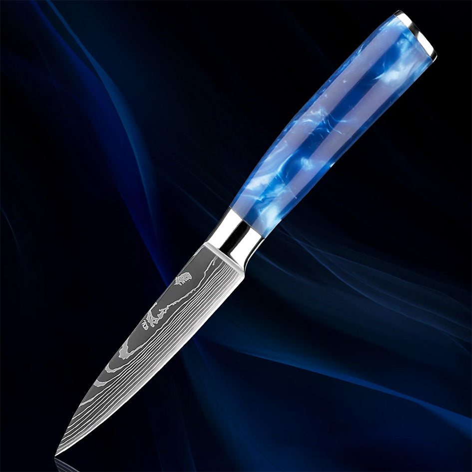 3.5" Razor Sharp Blue Paring Knife with a precision Damascus steel blade, perfect for peeling, trimming, and intricate cutting tasks. Designed with an ergonomic blue resin handle for comfort and control.