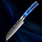 5" Razor Sharp Blue Santoku Knife featuring a Damascus steel blade with a precision edge for effortless slicing, dicing, and chopping. Designed with a sleek blue resin handle for superior grip and control.