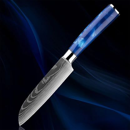5" Razor Sharp Blue Santoku Knife featuring a Damascus steel blade with a precision edge for effortless slicing, dicing, and chopping. Designed with a sleek blue resin handle for superior grip and control.