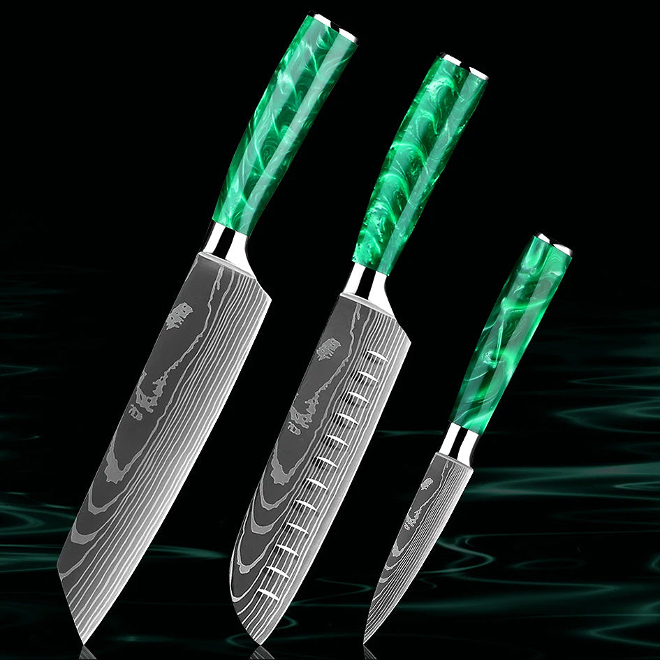 A trio of precision: Kiritsuke, Santoku, and Paring knives from the Kitchen Knife Set - Razor Sharp Green. Designed for versatility, sharpness, and comfort with ergonomic green resin handles. Get yours here: https://www.greengrillshop.com/products/kitchen-knife-set-razor-sharp-green
