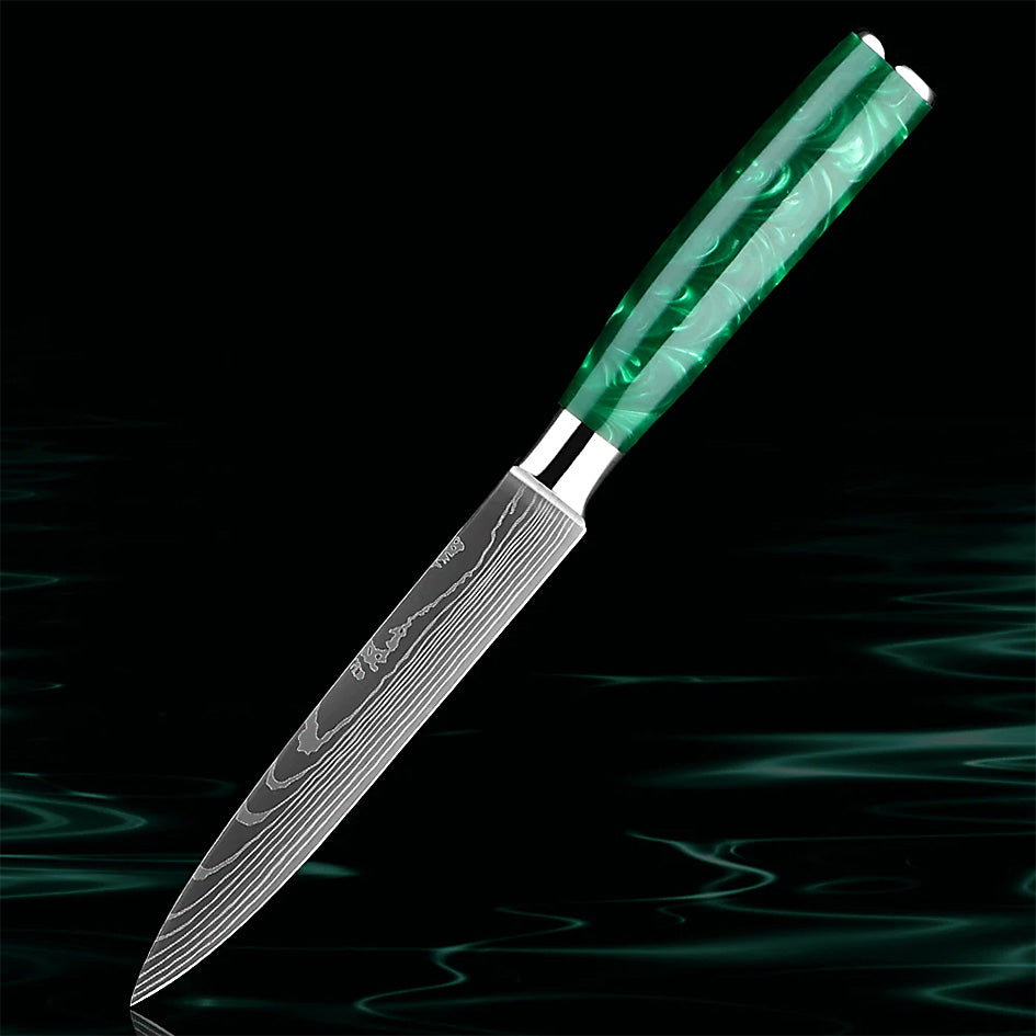 The Kitchen Knives - Razor Sharp Green 5" Slicing Knife is designed for precise cuts of meats, fruits, and vegetables. Its high-quality stainless steel blade ensures smooth and efficient slicing, while the ergonomic green resin handle provides a secure and comfortable grip. Perfect for professional chefs and home cooking enthusiasts. Available at: https://www.greengrillshop.com/products/kitchen-knives-razor-sharp-green.