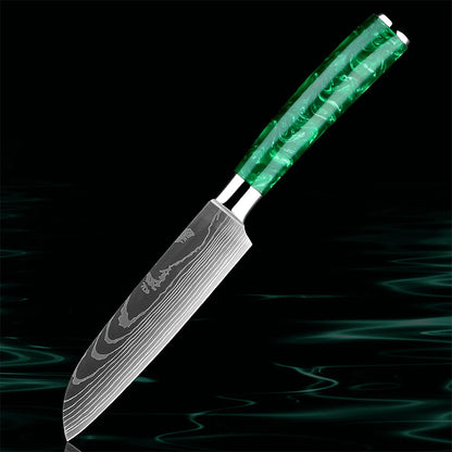The Kitchen Knives - Razor Sharp Green 5" Santoku Knife is a versatile tool for precision slicing, dicing, and chopping. Featuring a razor-sharp high-carbon stainless steel blade, it ensures effortless cutting performance. The ergonomic green resin handle provides a comfortable, non-slip grip for enhanced control. A must-have for any kitchen. Available at: https://www.greengrillshop.com/products/kitchen-knives-razor-sharp-green.