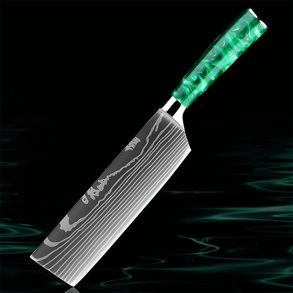 The Kitchen Knives - Razor Sharp Green 7" Nakiri Knife is designed for effortless vegetable chopping, slicing, and dicing. Featuring a razor-sharp high-carbon stainless steel blade, it delivers precision cuts with every use. The ergonomic green resin handle provides a comfortable, non-slip grip for maximum control. A must-have for any kitchen. Available at: https://www.greengrillshop.com/products/kitchen-knives-razor-sharp-green.