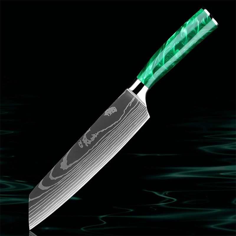 The Kitchen Knives - Razor Sharp Green 7.5" Kiritsuke Knife is a multifunctional chef's knife designed for precise slicing, dicing, and chopping. Featuring a razor-sharp high-carbon stainless steel blade, it delivers exceptional performance. The ergonomic green resin handle provides a comfortable, non-slip grip for maximum control. Elevate your cooking experience with this premium blade. Available at: https://www.greengrillshop.com/products/kitchen-knives-razor-sharp-green.